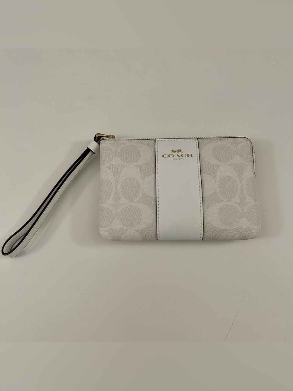 COACH White Signature Wristlet Clutch with Gold Logo